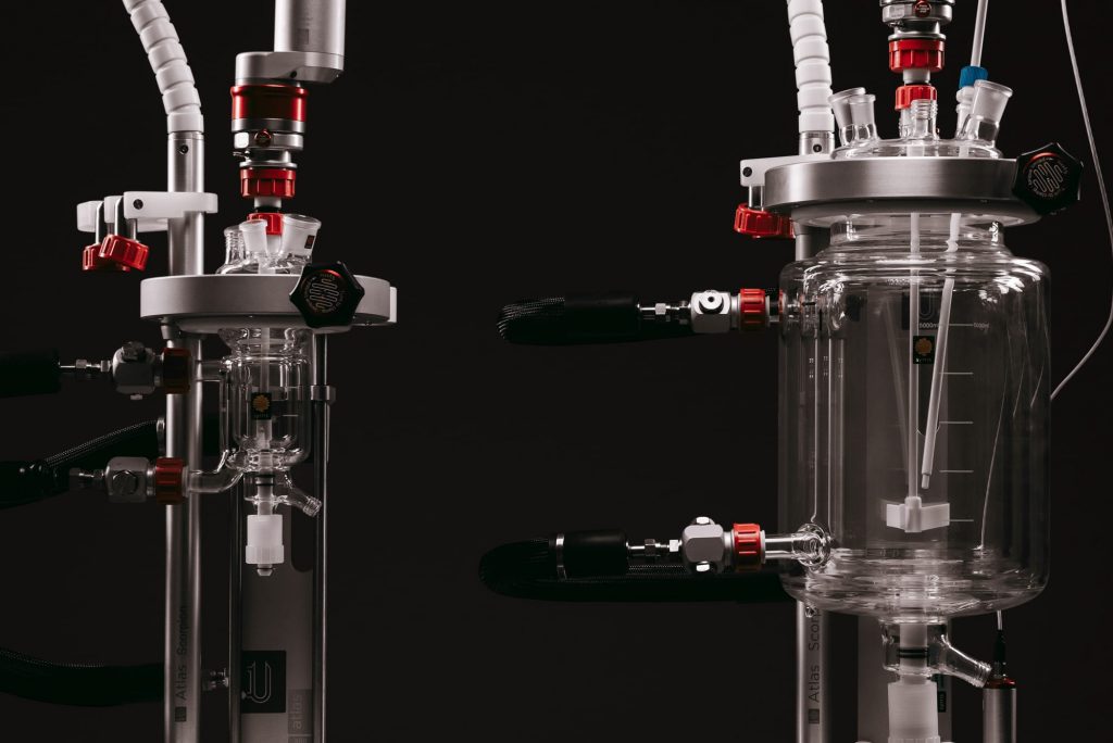 A photograph of 2 Syrris Atlas HD automated chemistry reactors with different size vessels