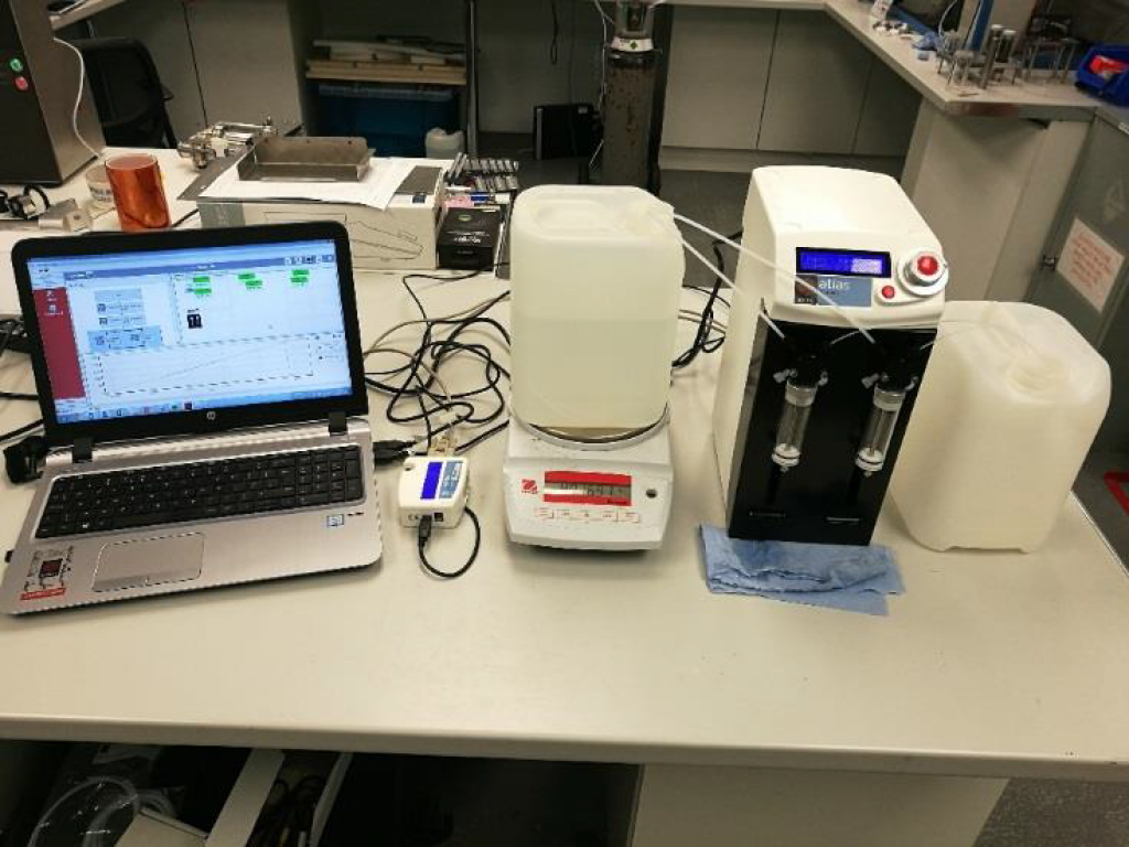 Pseudo-gravimetric dosing setup on Atlas Syringe Pump