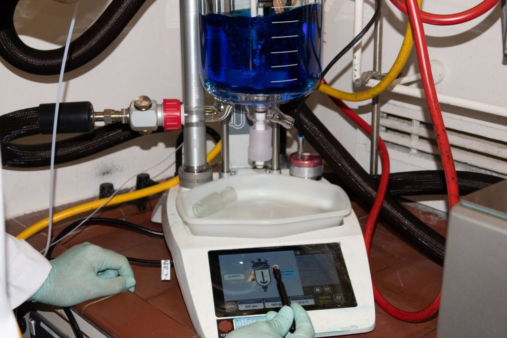 A picture of TauRX's lab showcasing the Atlas HD systems and Atlas Syringe Pumps - Walk-away API process development for TauRX with Syrris Atlas HD